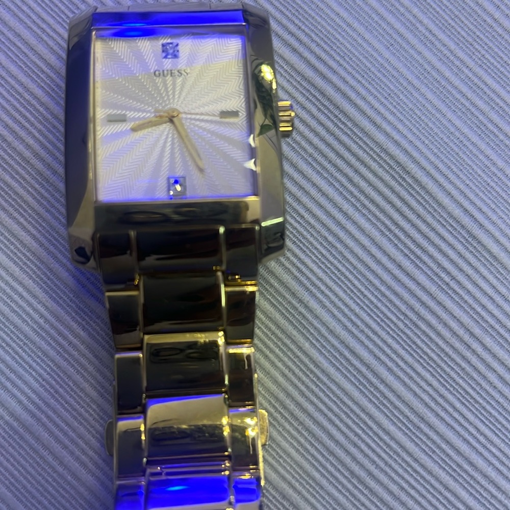 Gold guess watch